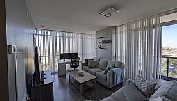 A Luxury Condo - 1 Bedroom + Den