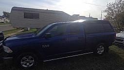 2014 Ram 1500 Quad Cab 4X4 – 3.6L V6 – Topper + Extra Rims & Tir