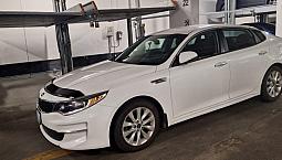 2018 Kia Optima Lx+ — White.  Low Milage; 74000 Km. Certified