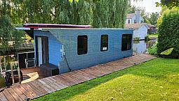 Bateau Maison  (Chalet Flottant  10 X 27)