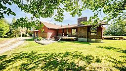 Sprawling Bungalow On Private Treed Lot