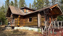 Coming Soon.  Log Home On 130 Acres