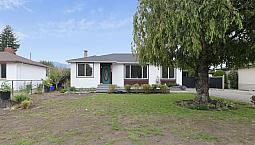 Spacious 3 Bedroom Upper Suite With Private Garage & Workshop In